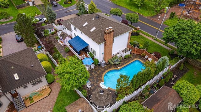 view from above of property with a pool area