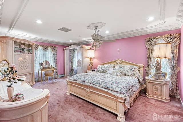 bedroom featuring light carpet, recessed lighting, crown molding, and a baseboard heating unit