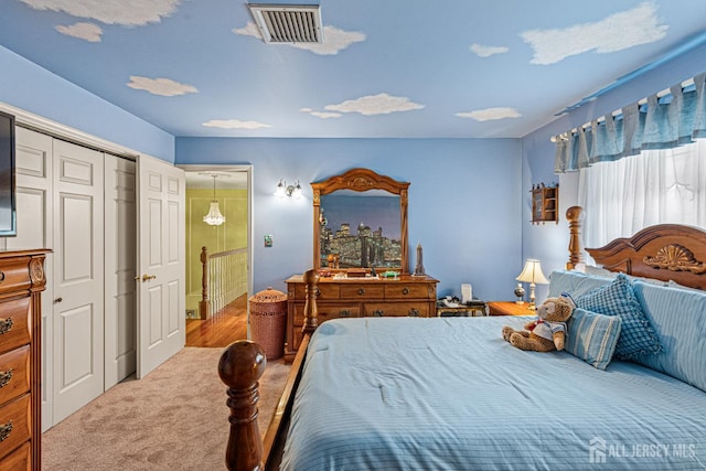 bedroom with carpet flooring and a closet