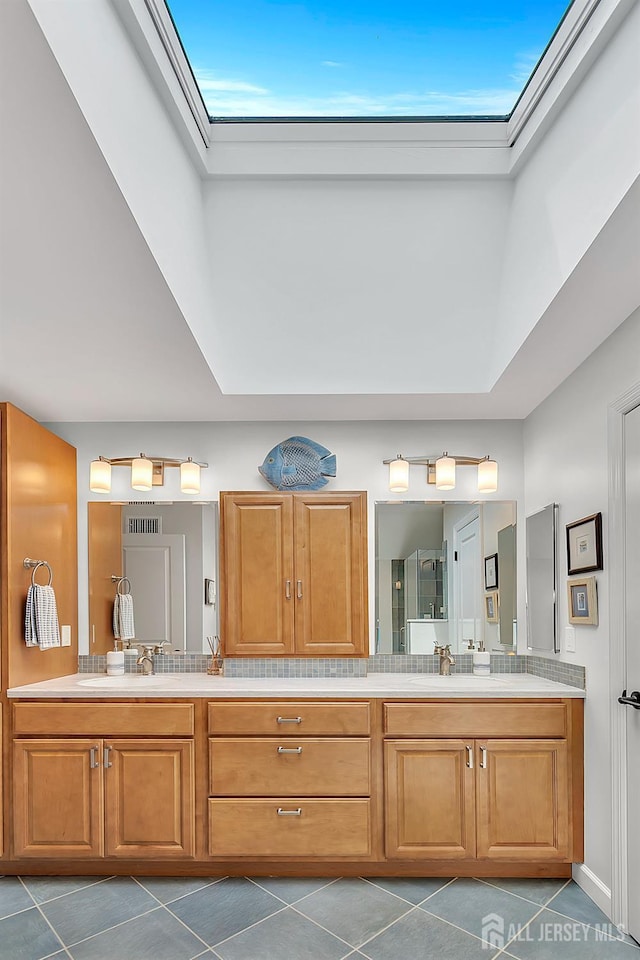 107 Sayre Dr, Plainsboro, NJ 08540 - full bath featuring double vanity, tile patterned floors, and a shower with shower door
