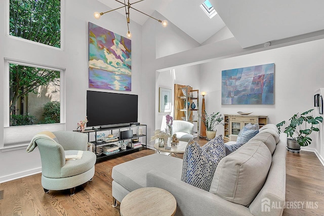 107 Sayre Dr, Plainsboro, NJ 08540 - living room with high vaulted ceiling and wood finished floors