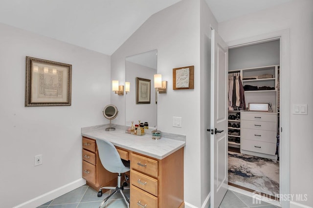 107 Sayre Dr, Plainsboro, NJ 08540 - bathroom featuring vaulted ceiling, a spacious closet, tile patterned floors, and vanity