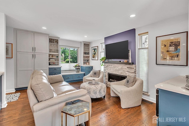 107 Sayre Dr, Plainsboro, NJ 08540 - living room featuring a fireplace, wood finished floors, and recessed lighting