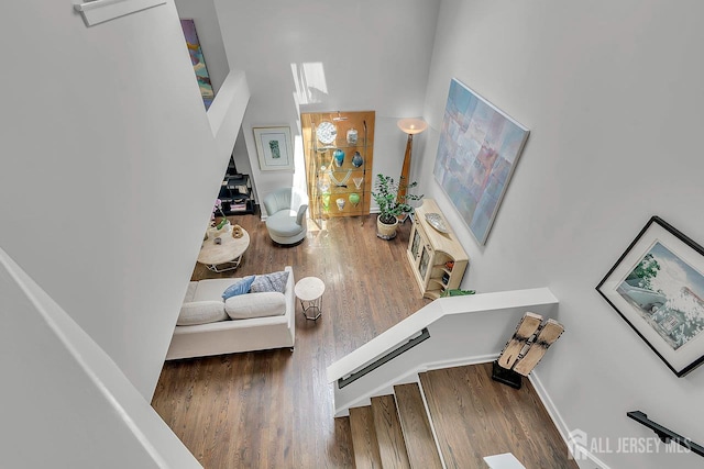 107 Sayre Dr, Plainsboro, NJ 08540 - stairway with wood finished floors and a high ceiling
