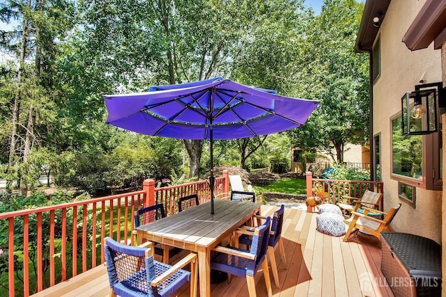 107 Sayre Dr, Plainsboro, NJ 08540 - deck with outdoor dining space and view of scattered trees
