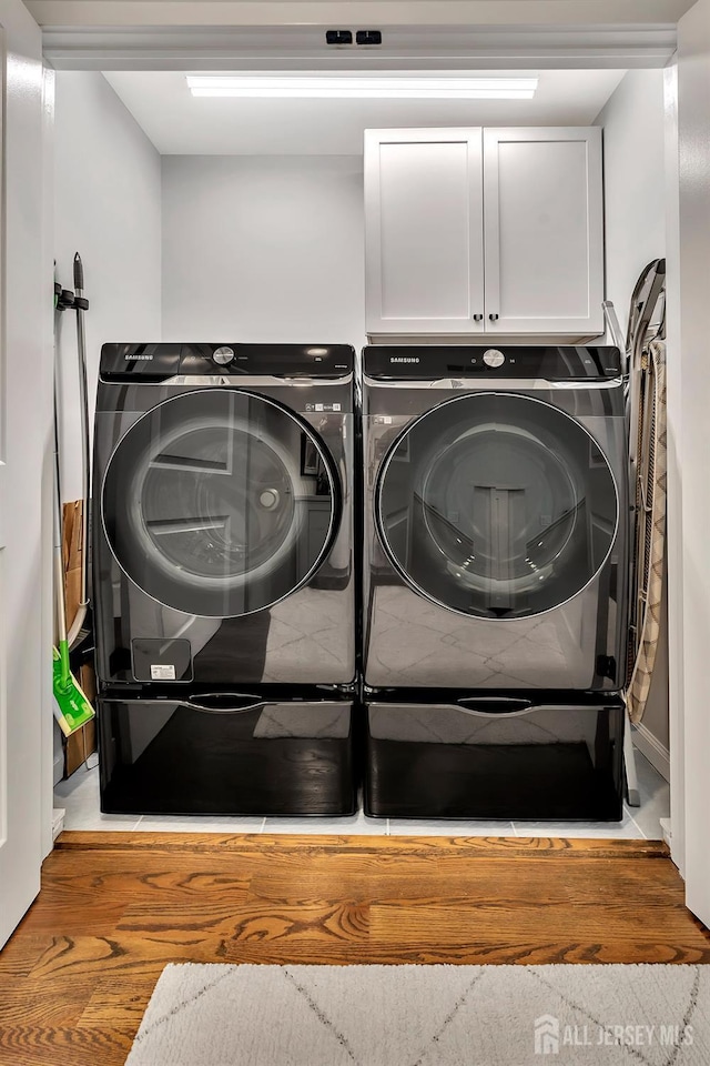 107 Sayre Dr, Plainsboro, NJ 08540 - laundry room with independent washer and dryer and cabinet space