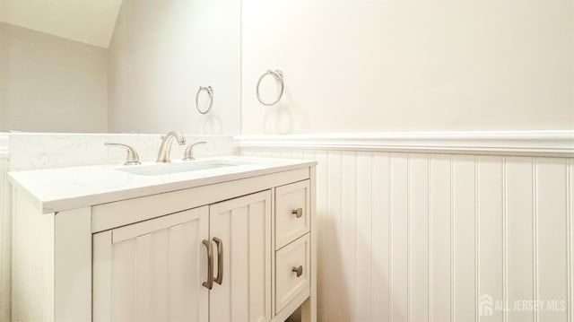 1204 Maplecrest Rd, Edison, NJ 08820 - bathroom featuring a wainscoted wall and vanity