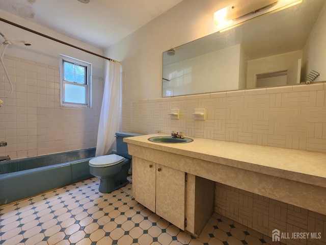 138 The Orchards Unit C, East Windsor, NJ 08512 - bathroom with shower / bathtub combination with curtain, vanity, tile walls, and tile patterned floors