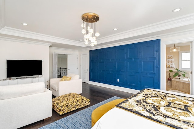 bedroom featuring dark wood finished floors, recessed lighting, an inviting chandelier, and ornamental molding