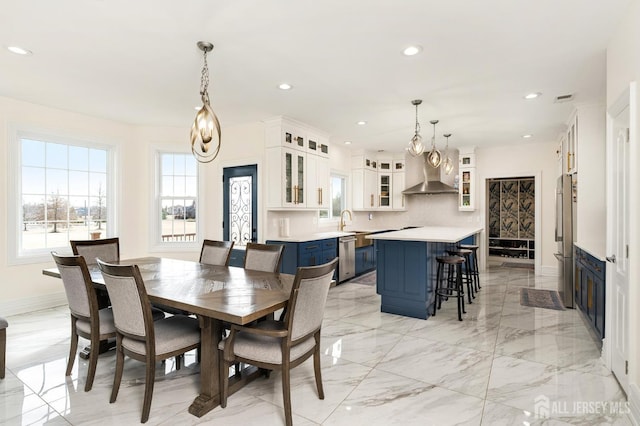 dining room with visible vents, recessed lighting, marble finish floor, and baseboards