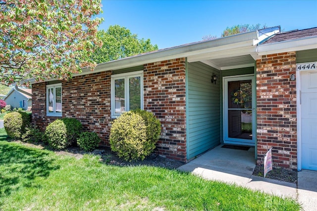 444 Dahlia Plz, Monroe, NJ 08831 - entrance to property featuring brick siding and a lawn