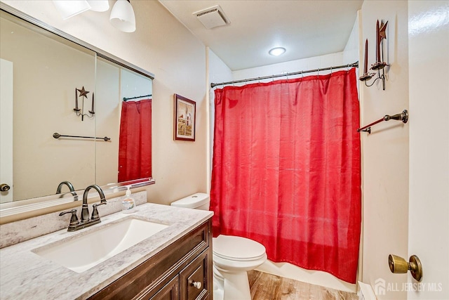 444 Dahlia Plz, Monroe, NJ 08831 - full bathroom featuring toilet, vanity, and wood finished floors