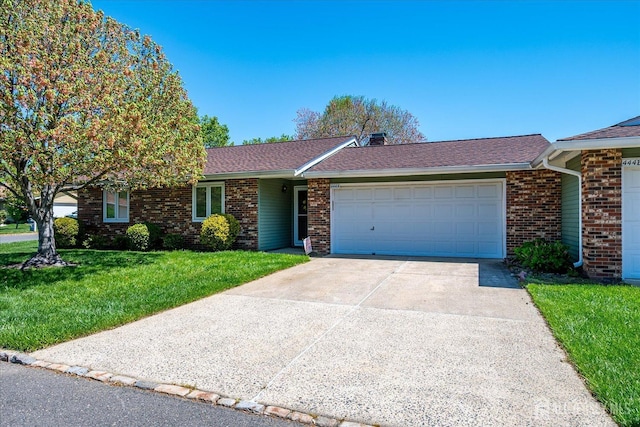 444 Dahlia Plz, Monroe, NJ 08831 - ranch-style home featuring an attached garage, brick siding, a front yard, driveway, and roof with shingles