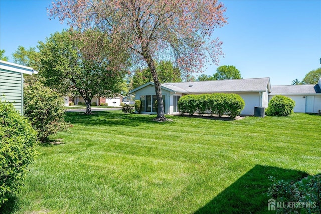444 Dahlia Plz, Monroe, NJ 08831 - view of green lawn featuring central air condition unit