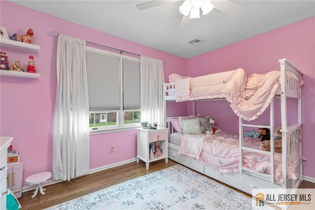411 Arlington Ave, South Plainfield, NJ 07080 - bedroom featuring wood finished floors, a ceiling fan, and baseboards