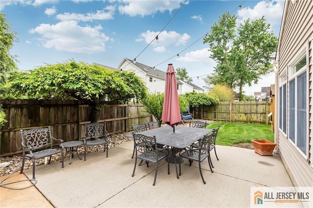 view of patio with outdoor dining area