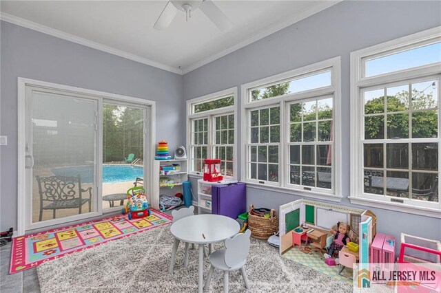 411 Arlington Ave, South Plainfield, NJ 07080 - game room featuring crown molding and ceiling fan