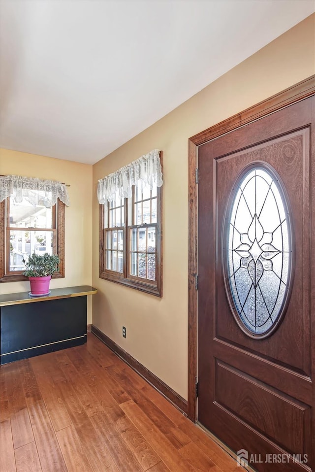352 Parker Ave, South Amboy, NJ 08879 - foyer entrance with wood finished floors and baseboards