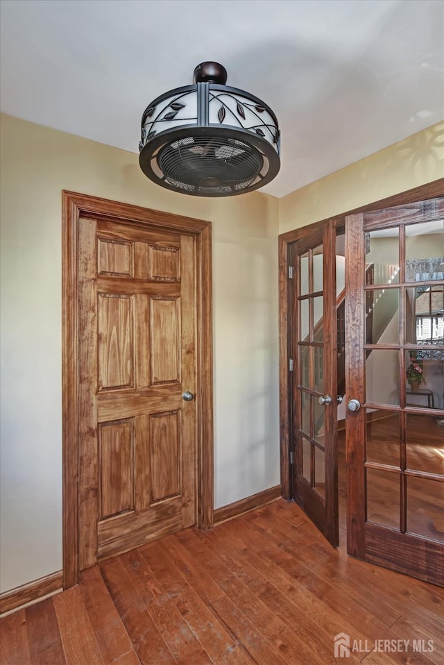 352 Parker Ave, South Amboy, NJ 08879 - entrance foyer with french doors, hardwood / wood-style floors, and baseboards