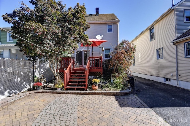 352 Parker Ave, South Amboy, NJ 08879 - view of front of house with a wooden deck and a chimney