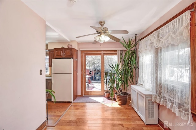 352 Parker Ave, South Amboy, NJ 08879 - entryway with light wood finished floors and ceiling fan
