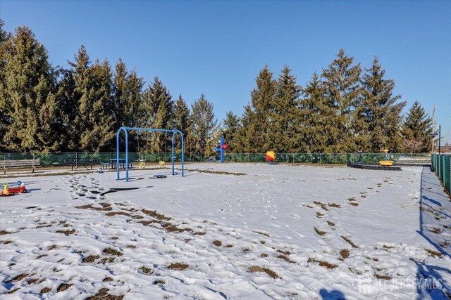 view of snow covered playground