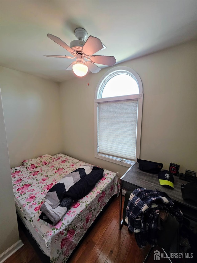 126 Holly St, Port Reading, NJ 07064 - bedroom with wood finished floors and a ceiling fan