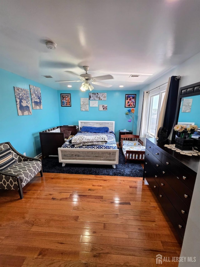 126 Holly St, Port Reading, NJ 07064 - bedroom featuring hardwood / wood-style flooring and a ceiling fan