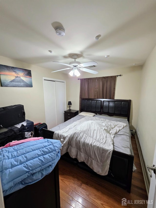 126 Holly St, Port Reading, NJ 07064 - bedroom featuring wood finished floors, a ceiling fan, and a closet