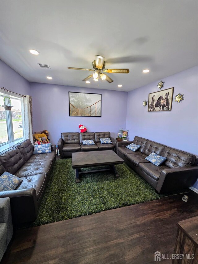 126 Holly St, Port Reading, NJ 07064 - living area featuring wood finished floors, a ceiling fan, and recessed lighting