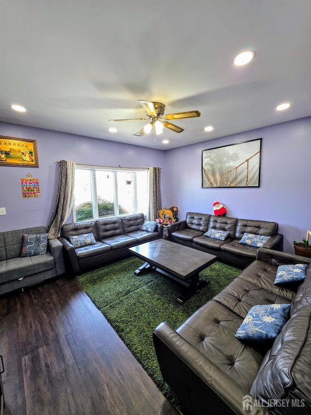 126 Holly St, Port Reading, NJ 07064 - living area featuring wood finished floors, a ceiling fan, and recessed lighting