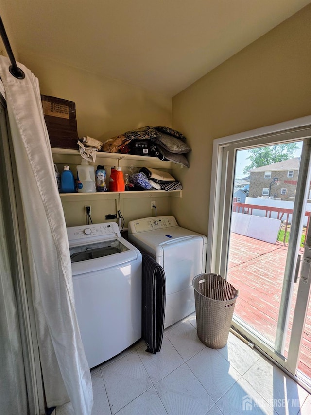 126 Holly St, Port Reading, NJ 07064 - washroom featuring washer and dryer and light tile patterned floors
