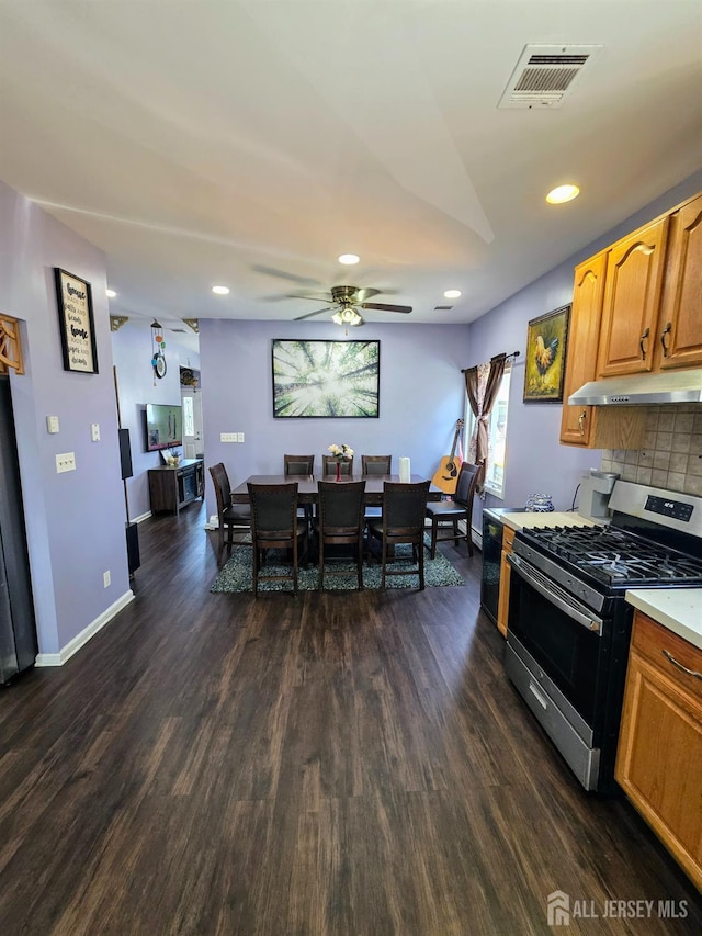 126 Holly St, Port Reading, NJ 07064 - dining area with a ceiling fan, healthy amount of natural light, dark wood finished floors, recessed lighting, and baseboards