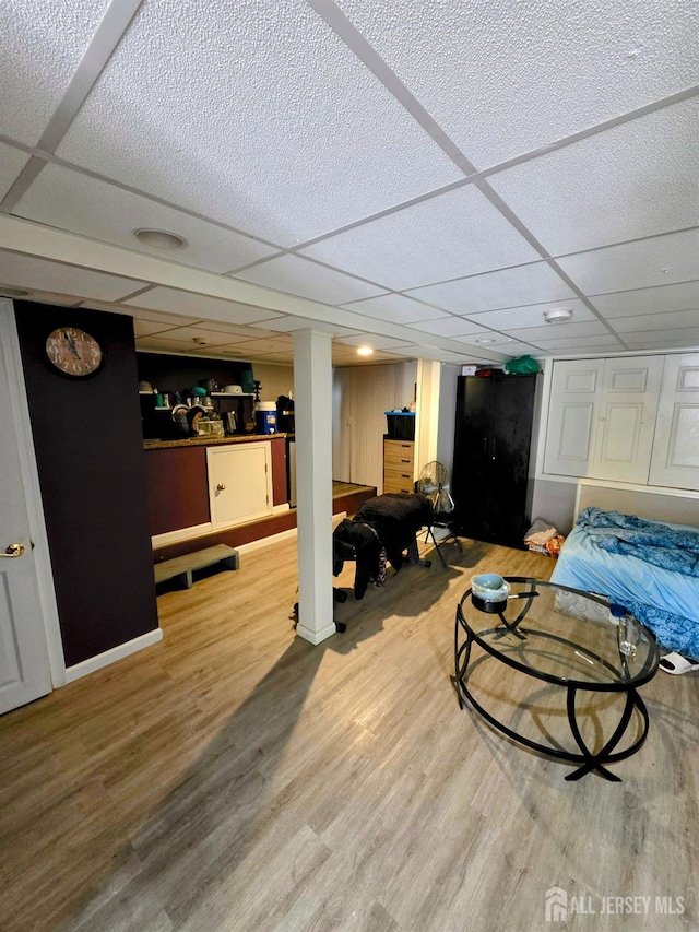 126 Holly St, Port Reading, NJ 07064 - bedroom with a drop ceiling and wood finished floors
