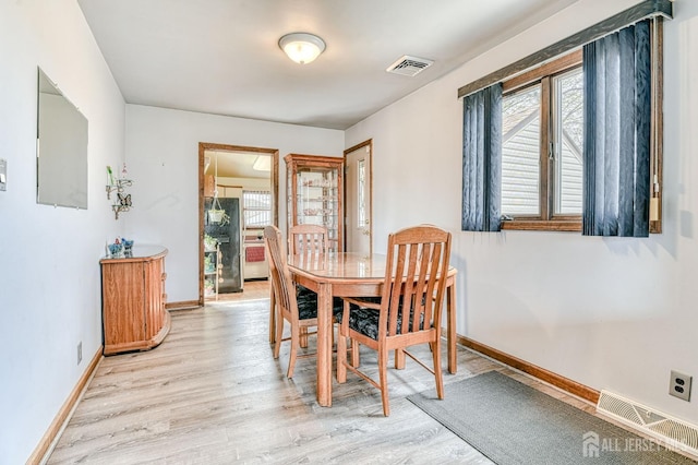 6 Schuyler Dr, Edison, NJ 08817 - dining area with light wood finished floors and baseboards