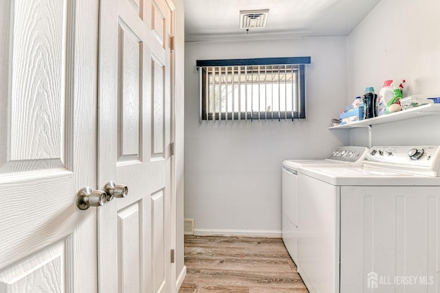 6 Schuyler Dr, Edison, NJ 08817 - laundry area featuring separate washer and dryer, light wood-type flooring, and baseboards
