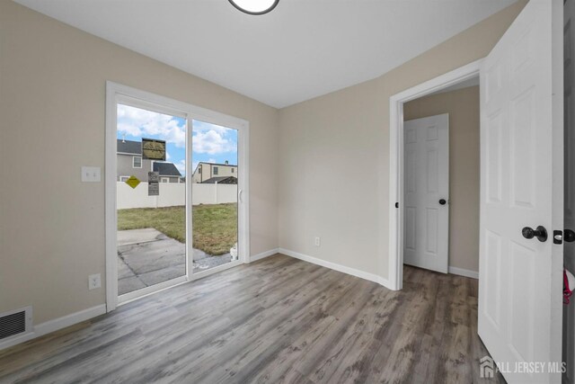 empty room featuring light hardwood / wood-style flooring