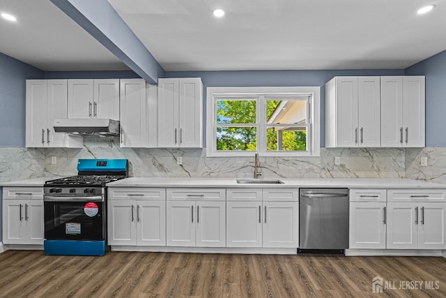 790 Ridge Rd, South Brunswick, NJ 08852 - kitchen featuring stainless steel appliances, under cabinet range hood, dark wood-type flooring, white cabinets, and recessed lighting