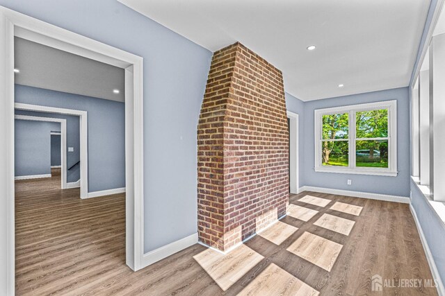 790 Ridge Rd, South Brunswick, NJ 08852 - unfurnished living room featuring wood finished floors and recessed lighting