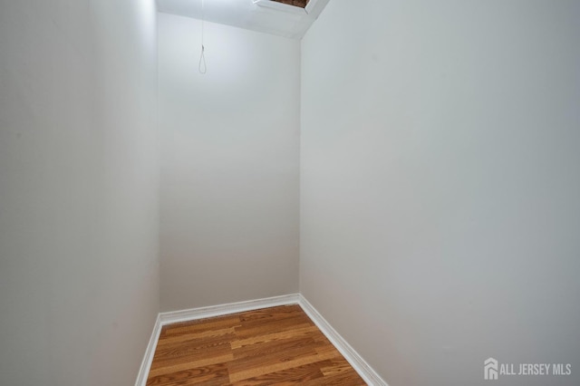 34 Hershey Rd, East Brunswick, NJ 08816 - unfurnished room featuring wood finished floors and baseboards
