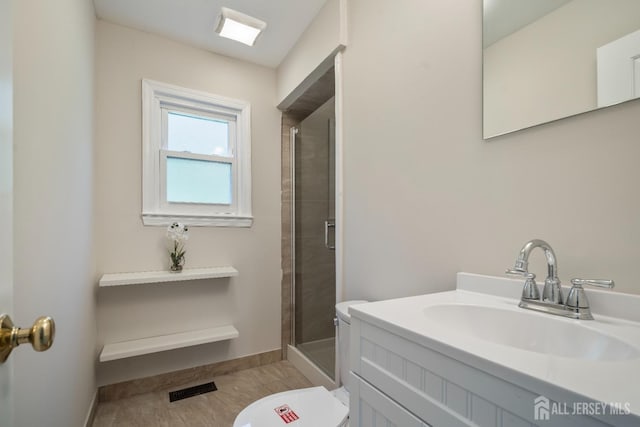 34 Hershey Rd, East Brunswick, NJ 08816 - full bath featuring toilet, a shower stall, vanity, and baseboards