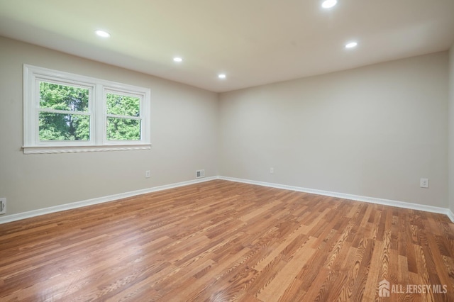 34 Hershey Rd, East Brunswick, NJ 08816 - spare room with recessed lighting, baseboards, and light wood-type flooring