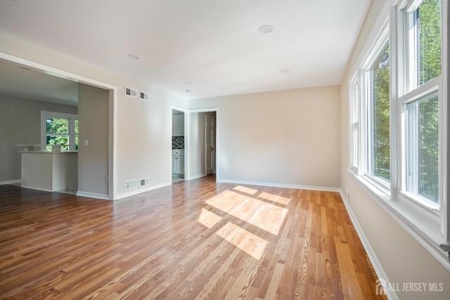 34 Hershey Rd, East Brunswick, NJ 08816 - spare room featuring light wood-type flooring and baseboards