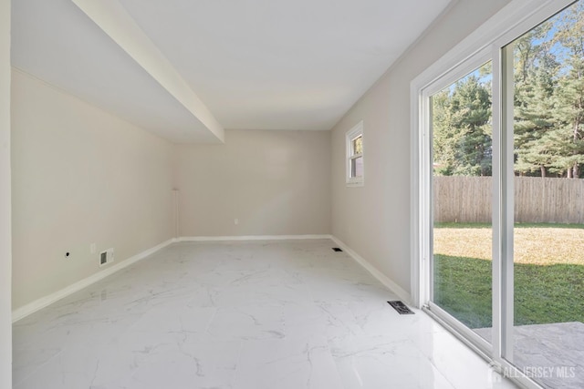 34 Hershey Rd, East Brunswick, NJ 08816 - empty room with baseboards and light marble finish floors