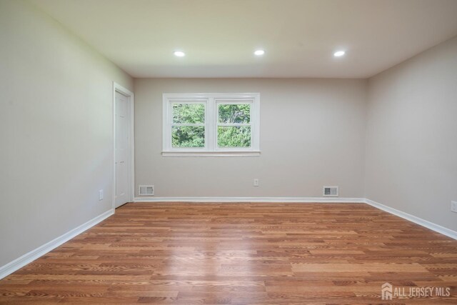 34 Hershey Rd, East Brunswick, NJ 08816 - spare room featuring light wood finished floors, recessed lighting, and baseboards