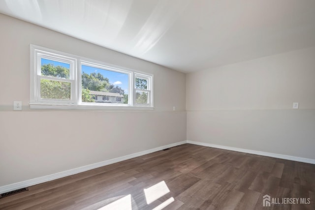 34 Hershey Rd, East Brunswick, NJ 08816 - unfurnished room with wood finished floors and baseboards