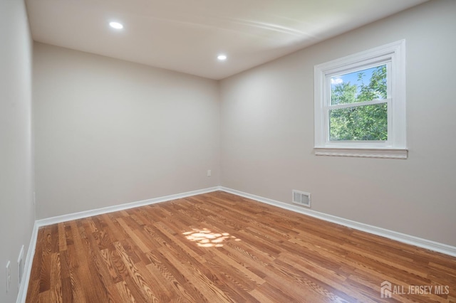 34 Hershey Rd, East Brunswick, NJ 08816 - spare room with light wood-style flooring, baseboards, and recessed lighting