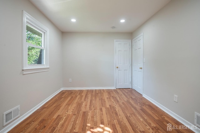 34 Hershey Rd, East Brunswick, NJ 08816 - unfurnished room with light wood-style flooring, baseboards, and recessed lighting