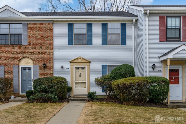 multi unit property with a shingled roof