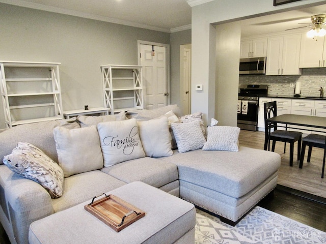 1029 Cricket Ln, Woodbridge Proper, NJ 07095 - living room with ornamental molding, light wood-style flooring, and a ceiling fan